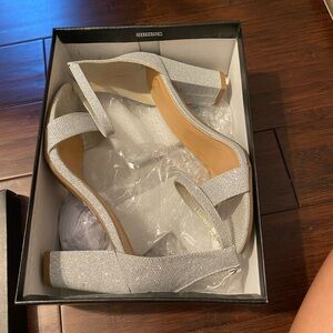 silver heels. only worn once for prom